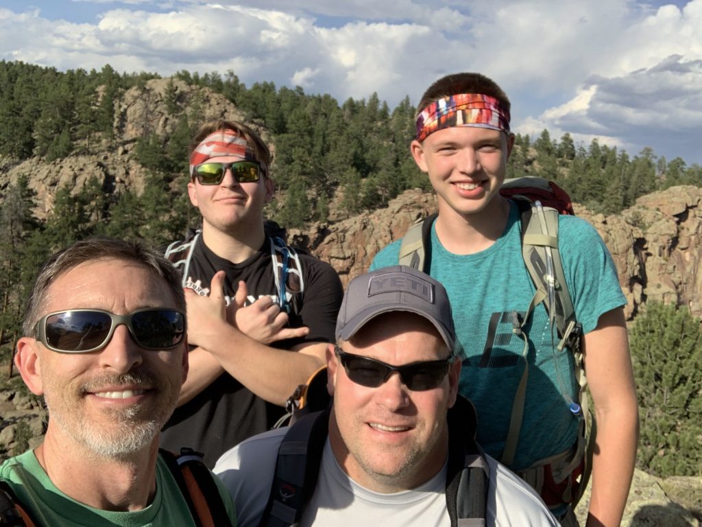 a photo of Jeff Courtney hiking with family